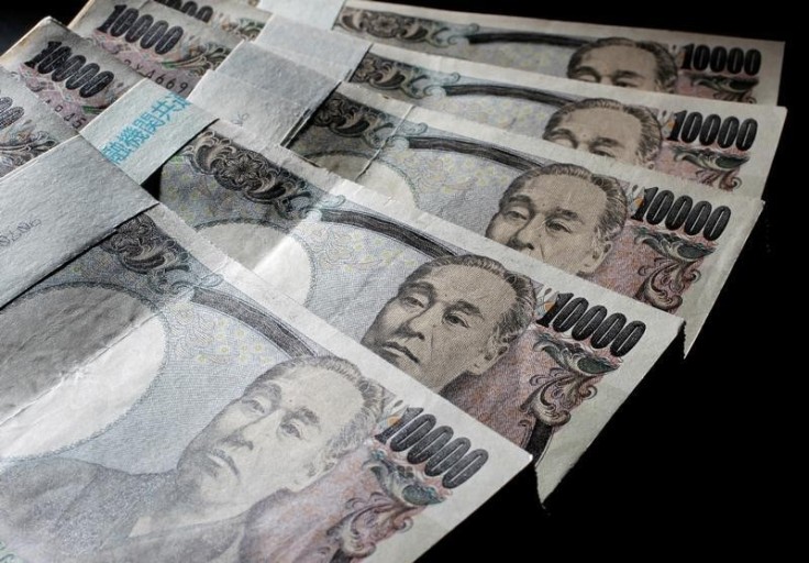 Illustrative picture shows Japanese 10,000 yen bank notes spread out at an office of World Currency Shop in Tokyo